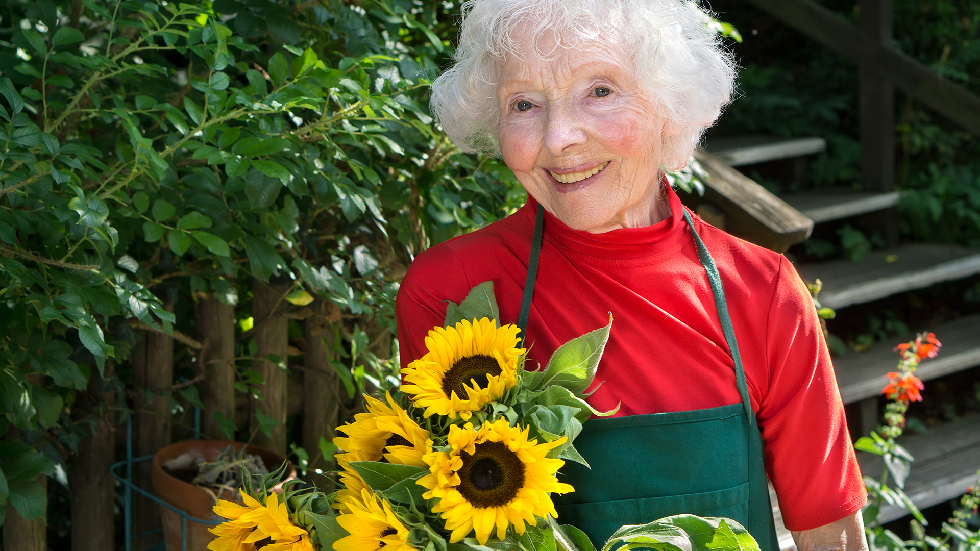 woman enjoying gardening and outdoor activities for seniors